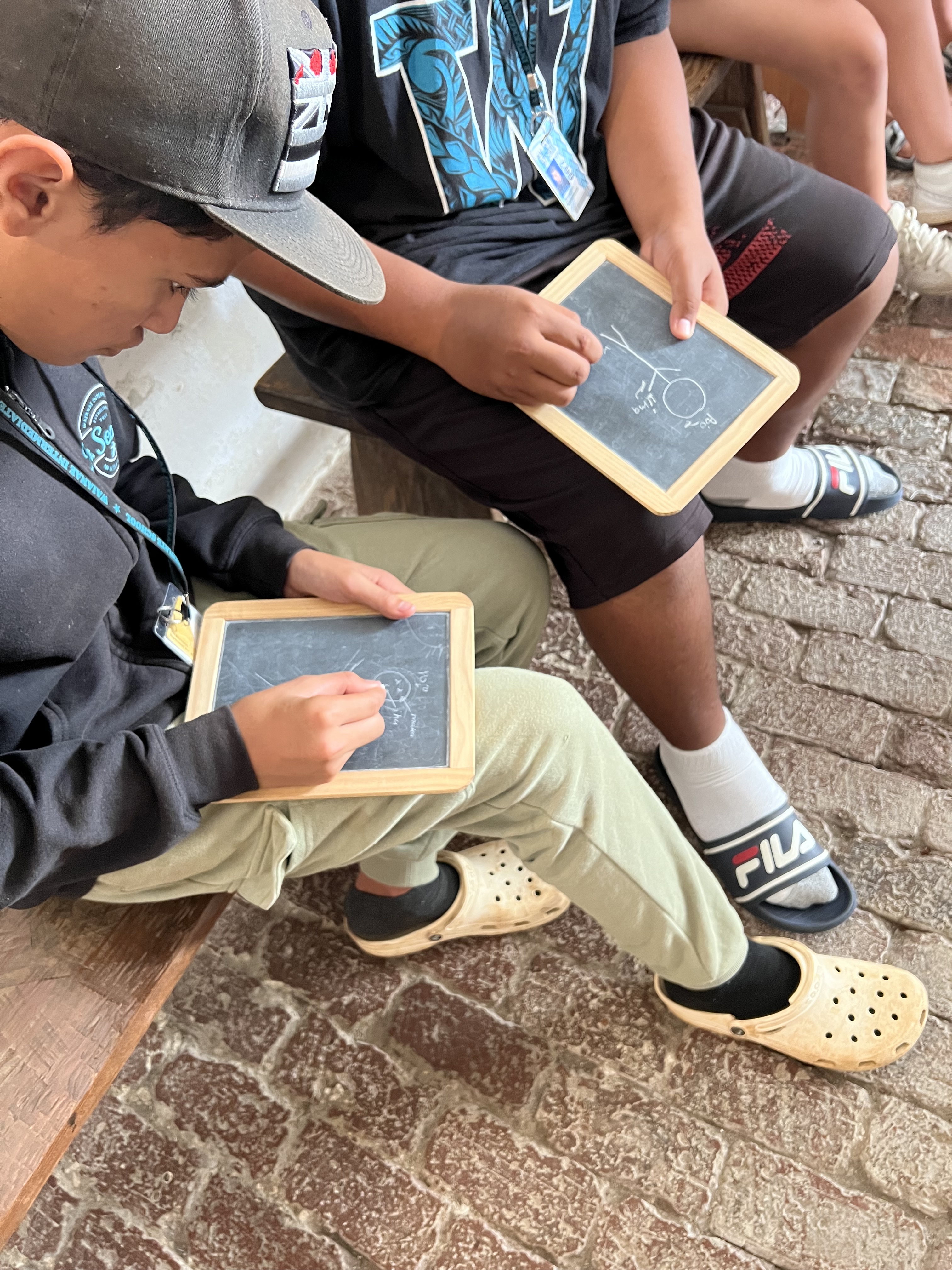 Student participating in field trip activity station